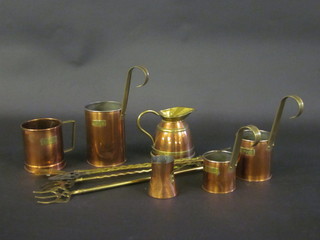 A copper and brass jug, 5 various copper measures, 3 toasting forks and a brass shoe horn