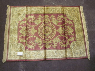 An Aubusson style gold ground rug 66" x 49"