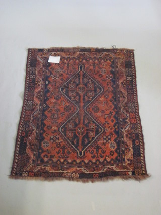A brown ground Caucasian rug 57" x 41"