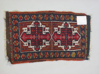An Eastern slip rug 38" x 18"