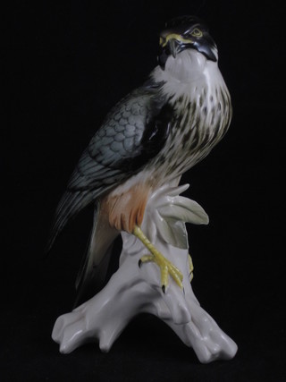 A Continental porcelain figure of a bird of prey 9"