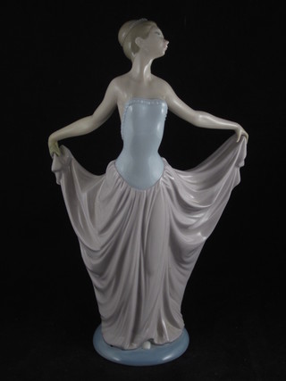 A large Lladro figure of a standing lady 12", hands R,