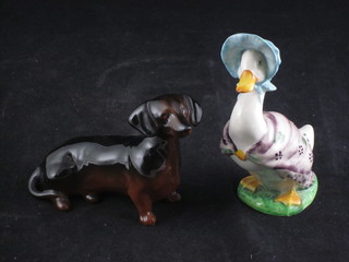A Beswick Beatrix Potter figure - Jemima Puddleduck, base  marked 1948, with brown mark, together with a figure of a  Dachshund 4"