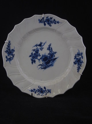 An 18th Century blue and white porcelain plate with floral  decoration 9"