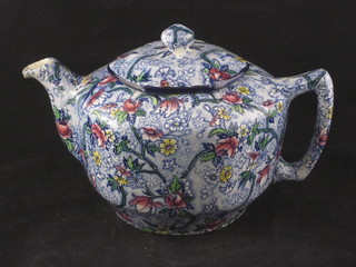 A Ringtons blue and floral patterned teapot
