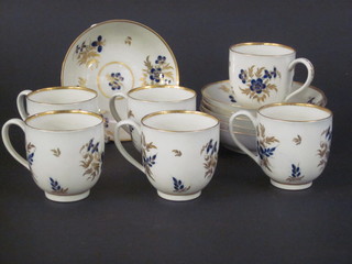 6 18th Century coffee cans and saucers with blue and gilt decoration