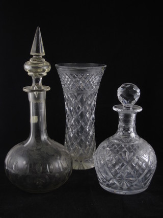 2 club shaped decanters and stoppers and a glass vase