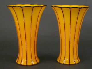A pair of orange Art Glass trumpet shaped vases 8"