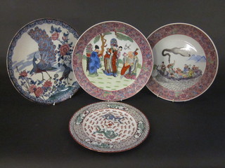 A pair of Oriental style plates and 2 other decorative plates