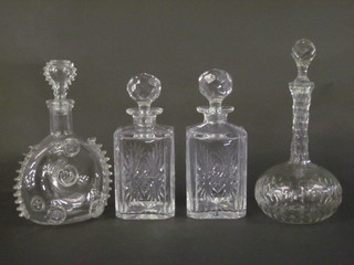 A moulded cut glass decanter and stopper made for Remy Martin and CLE, together with 2 spirit decanters marked Thomas Webb  and 1 other