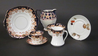 A 35 piece Royal Albert Derby style tea service comprising 2  twin handled bread plates 10", 9 side plates 7" - 1 f, a sugar  bowl and cream jug - both cracked, 11 saucers - 1 cracked, 10  cups - 8 cracked and a Johnsons Derby patterned teapot stand,  twin handled sugar bowl, cream jug,d 9 Wedgwood Bermuda  pattern plates 6" and matching saucer 5 1/2" and 5 Worcester  porcelain saucers 7" decorated cherries and walnuts