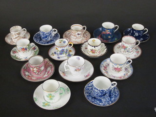 A Spode Christine pattern coffee can and saucer, a Copeland coffee can and saucer and 12 other coffee cans and saucers