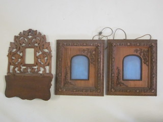A carved and pierced bracket fitted a mirror and 2 frames 11"