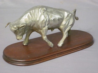 A silver plated figure of a charging bull 9"