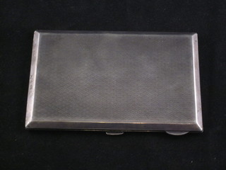 A silver cigarette case with engine turned decoration Birmingham 1932, 4 1/2 ozs