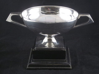 A silver twin handled trophy cup, Birmingham 1924, 10 1/2 ozs  ILLUSTRATED