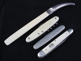 A multi bladed Jack knife together, 2 pocket knives and an ivory  and silver handled paper knife