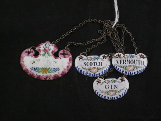 An enamelled decanter label and 3 other enamelled labels - Scotch, Gin and Vermouth