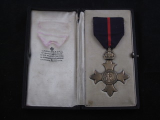 A first type breast badge of an Officer of The Most Excellent Order of The British Empire, Military Division, cased