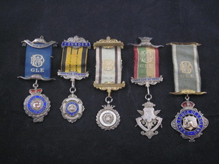 5 various silver gilt and enamel Buffalo jewels,