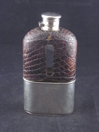 A Victorian glass and silver mounted hip flask with detachable  cup, Birmingham 1895