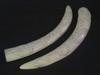 A carved section of ivory tusk 18"