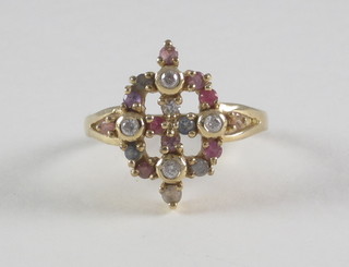 A 9ct yellow gold dress ring set 4 diamonds and sapphires