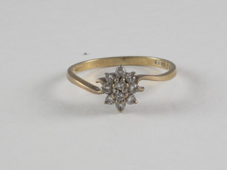 A 9ct yellow gold cluster dress ring set diamonds
