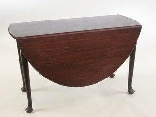 A Georgian oak oval drop flap gateleg dining table 48"
