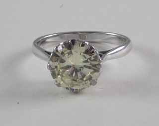 An lady's 18ct white gold solitaire dress/engagement ring set a  diamond, approx 3ct
