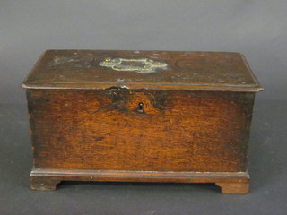 An 18th/19th Century apprentice coffer with hinged lid, the interior fitted a candle box and secret compartment fitted 1 long  and 2 short drawers, raised on bracket feet 13"