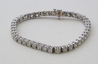 A lady's 18ct white gold bracelet set 41 diamonds, approx 10.2ct