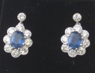 A pair of sapphire and diamond earrings, approx 1.60/1.85ct