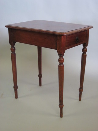 A Victorian rectangular mahogany table, fitted a drawer, raised  on turned supports 27"