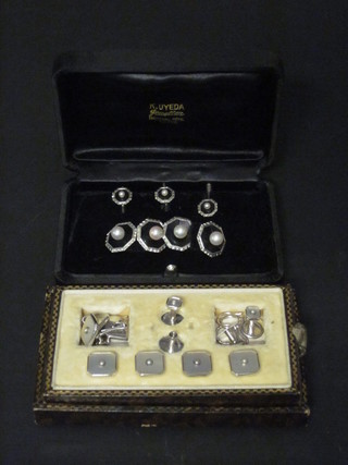 2 sets of gentleman's silver and enamelled evening studs and cufflinks