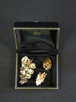 A Danish gold plated on silver leaf shaped brooch and matching earrings