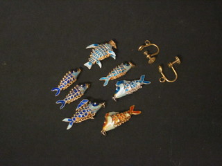 A pendant in the form an articulated enamelled fish and 6 other pendants
