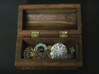 An Eastern arch shaped trinket box containing a small collection  of costume jewellery