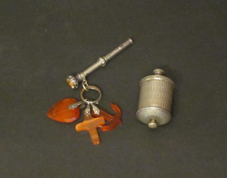 A Victorian silver cased propelling pencil hung 3 hardstone  pendants representing faith, hope and charity, together with a  tape measure case, f,