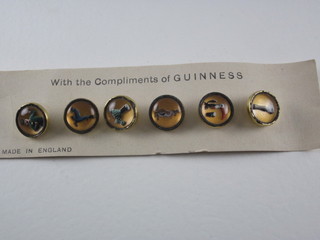A set of 6 Guinness studs