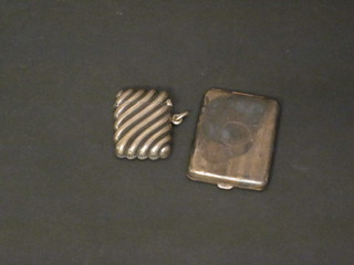 A silver vesta case and a silver match slip