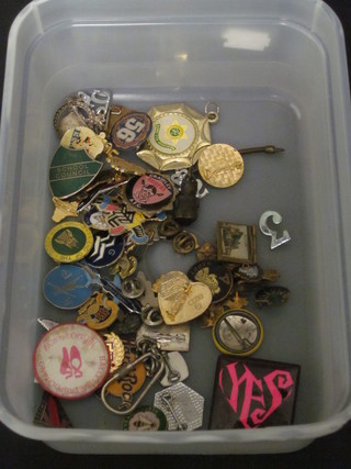 A collection of enamelled badges
