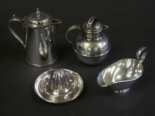 A silver plated hotelware hotwater jug, a sauce boat, lemon squeezer and a Jersey milk canister