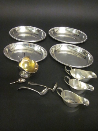 A silver plated sugar scuttle, 3 silver plated sauce boats, pair of entree dishes and covers, no handles, and 2 silver plated sifter  spoons