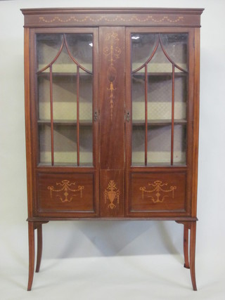 An Edwardian inlaid mahogany display cabinet enclosed by  panelled doors 41"