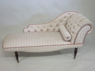 A Victorian style mahogany framed chaise longue upholstered in floral patterned material 56"