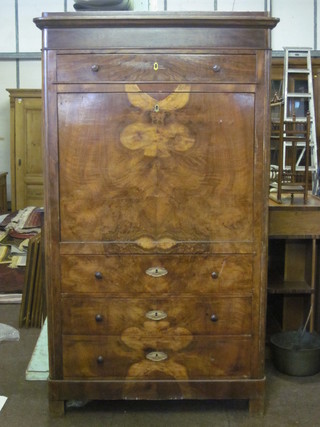 A 19th Century French walnut escritoire fitted a drawer, the fall front revealing a well fitted interior above 3 long drawers 39"
