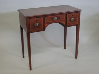 A 19th Century mahogany side table with crossbanded top, fitted 1 long drawer flanked by 2 short drawers, raised on square  tapering supports 31"  ILLUSTRATED
