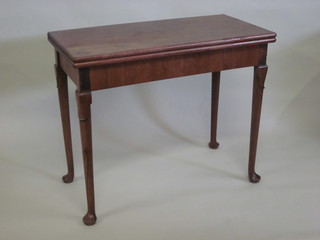 A rectangular Georgian mahogany card table, raised on club  supports 35"