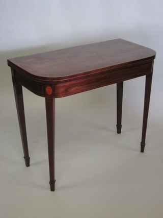 A Georgian mahogany D shaped card table with crossbanded top,  inlaid satinwood stringing and raised on square tapering supports  ending in spade feet 34"